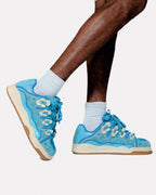 Soft Serve 01 sneaker by WUUSKÎ — Brunnera Blue colorway, styled