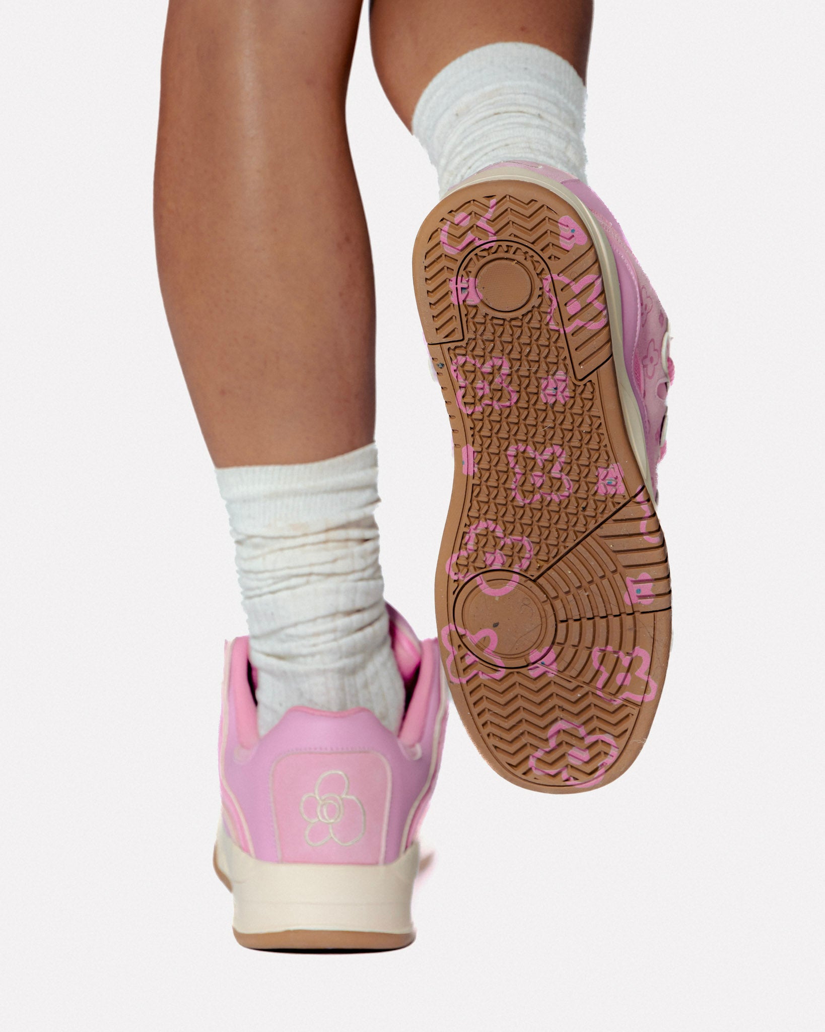 Soft Serve 01 sneaker by WUUSKÎ — Peony Pink colorway, styled