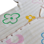 "Misquamicut" crochet knit shirt by WUUSKÎ — rhinestone pearl button detail