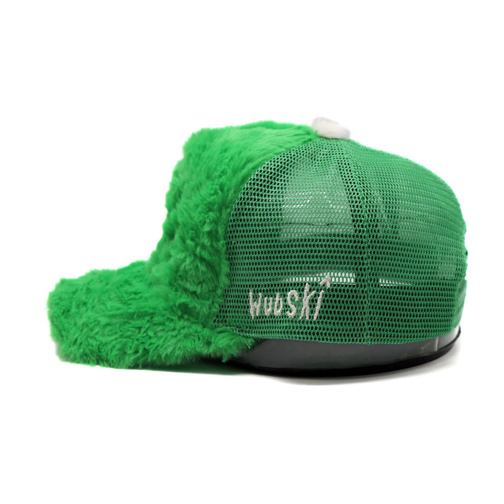 "Rewolf" green fur trucker hat by WUUSKÎ — side view, faux fur brim