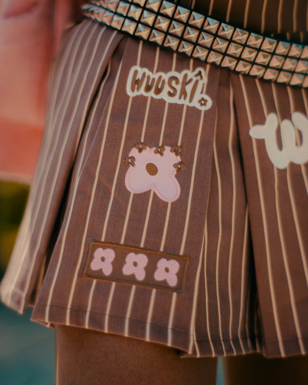 "Unîversity" pleated skort by WUUSKÎ — lifestyle, flower-inspired brand